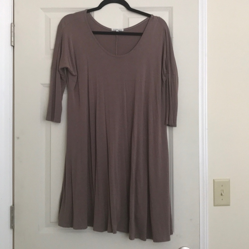 Quarter sleeve length tan dress